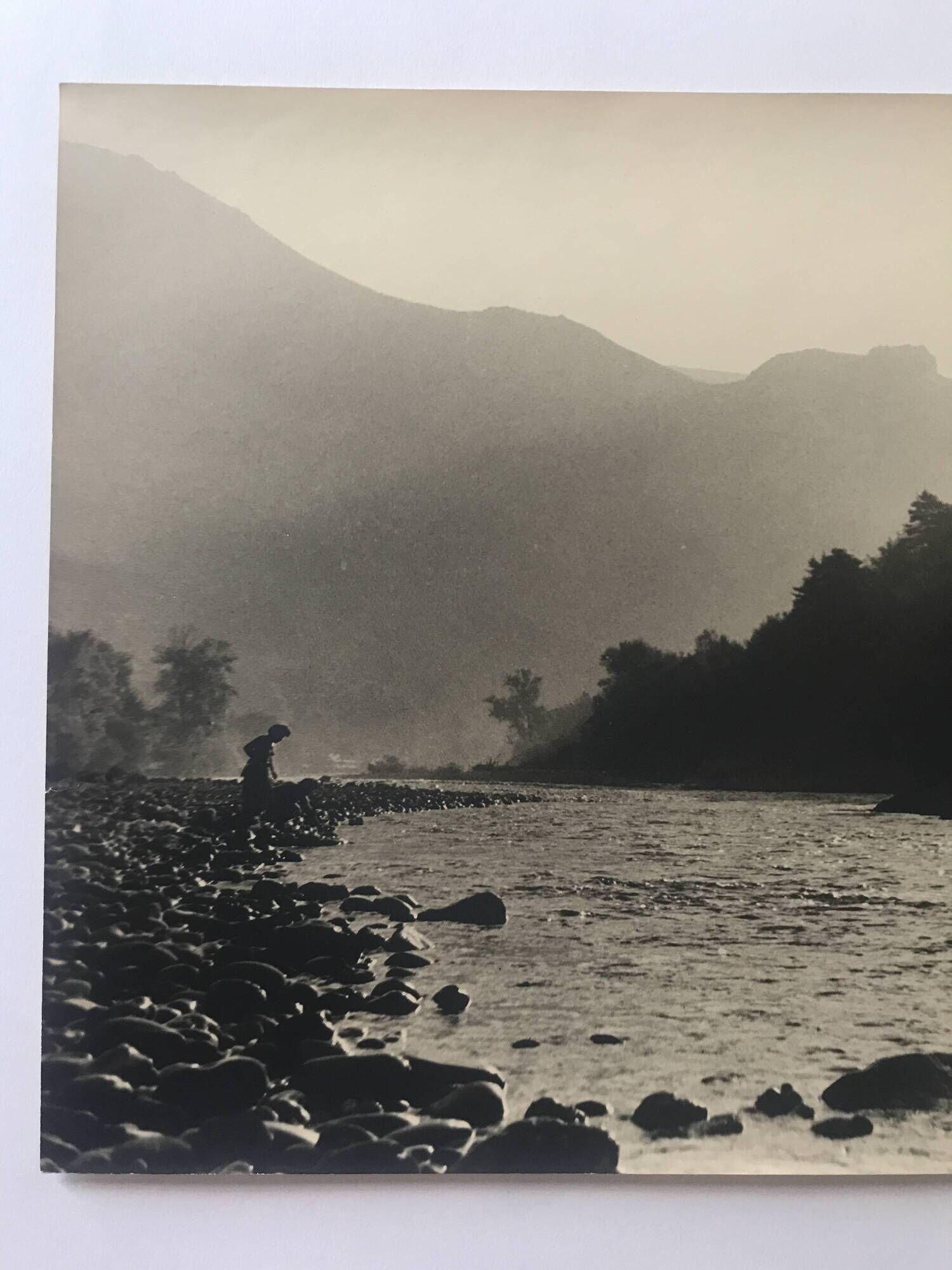 River landscape with characters, 60s/70s. Black and white silver print.