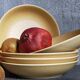 Five vintage natural stoneware soup plates