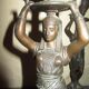 Pair of antique Egyptian-style spelter torches.