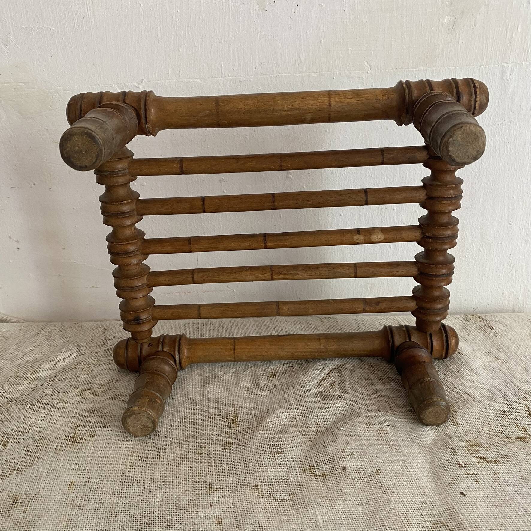 Old low turned wooden stool