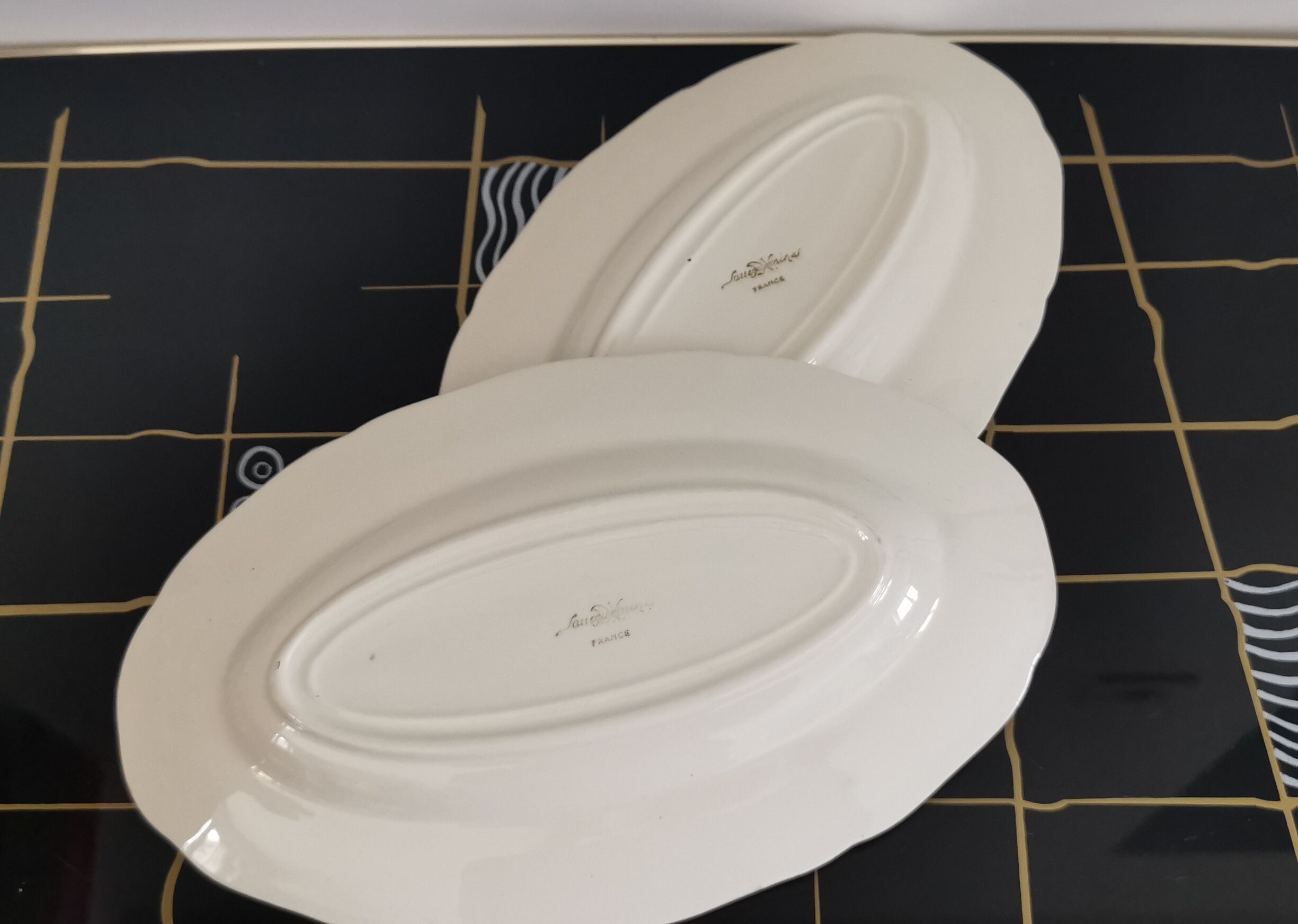 2 oval raviers Sarreguemines solid ivory color