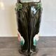 Antique ceramic vase by De Bruyn with floral decoration.