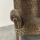Vintage leopard velvet sofa / wall sofa with drop-down arms, France.