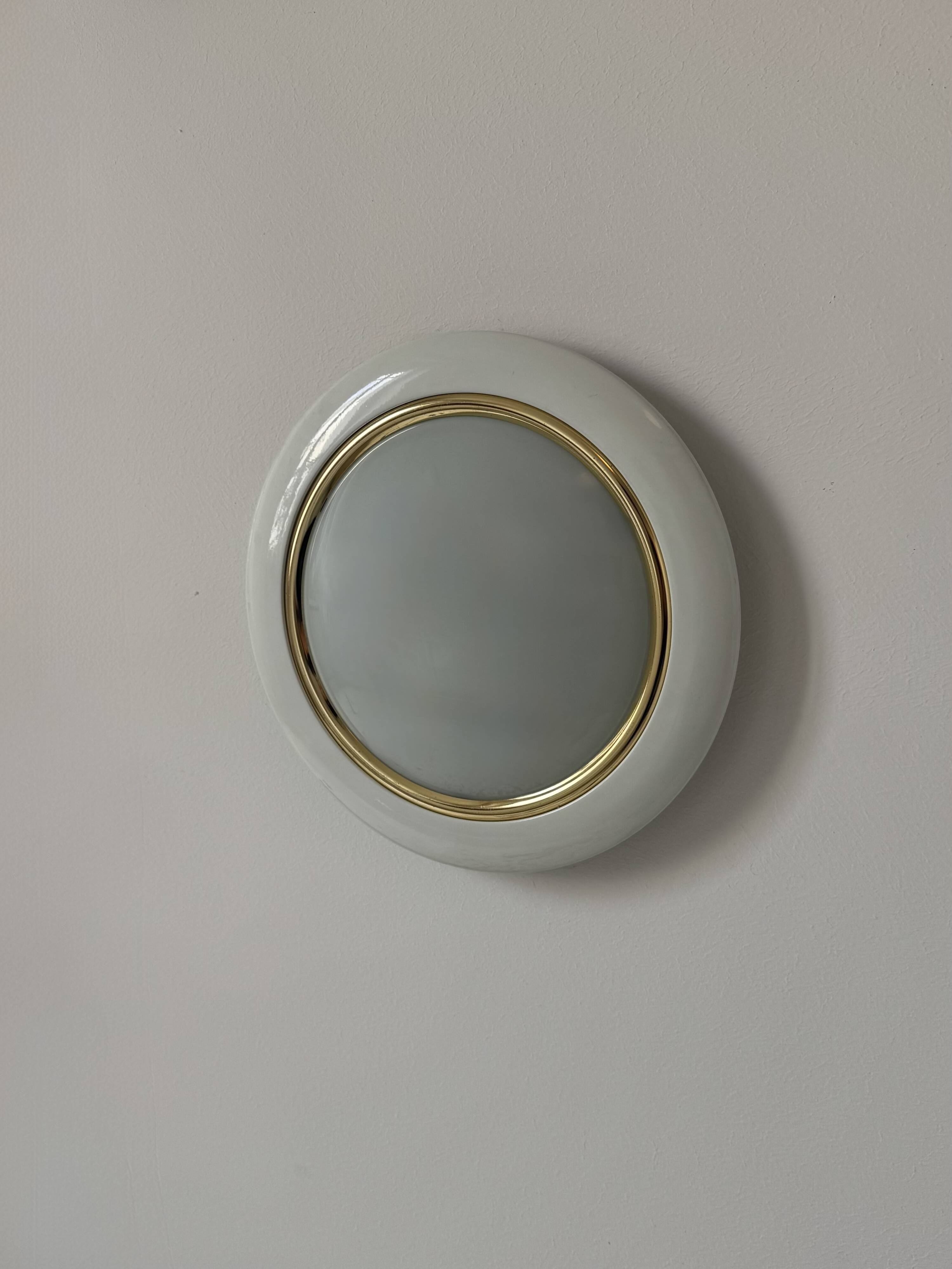 Vintage circular wall lights, brass metal and frosted glass, France 1980.