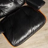 Eames lounge chair in black leather, around 1980