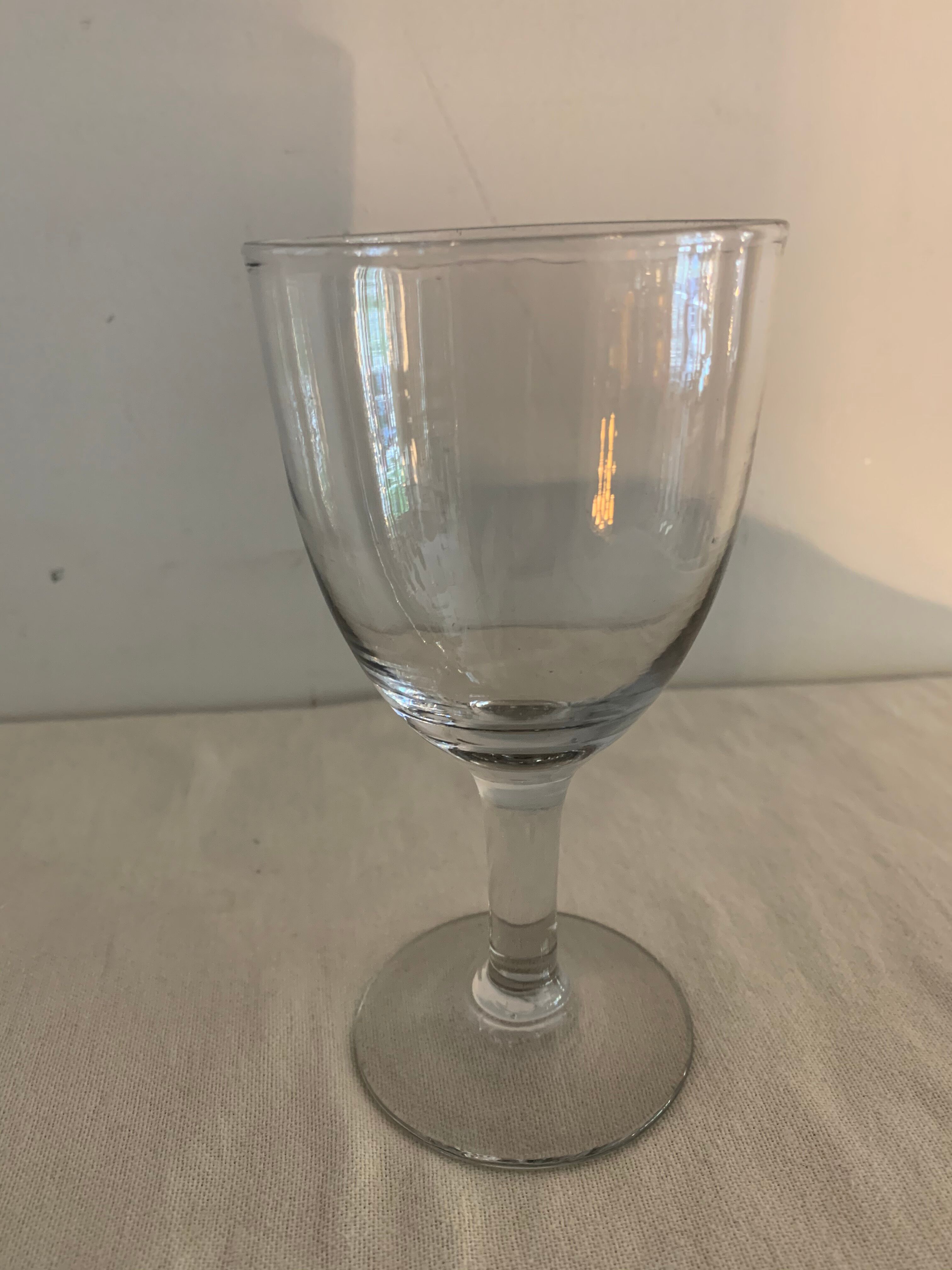 8 old blown and different foot wine glasses
