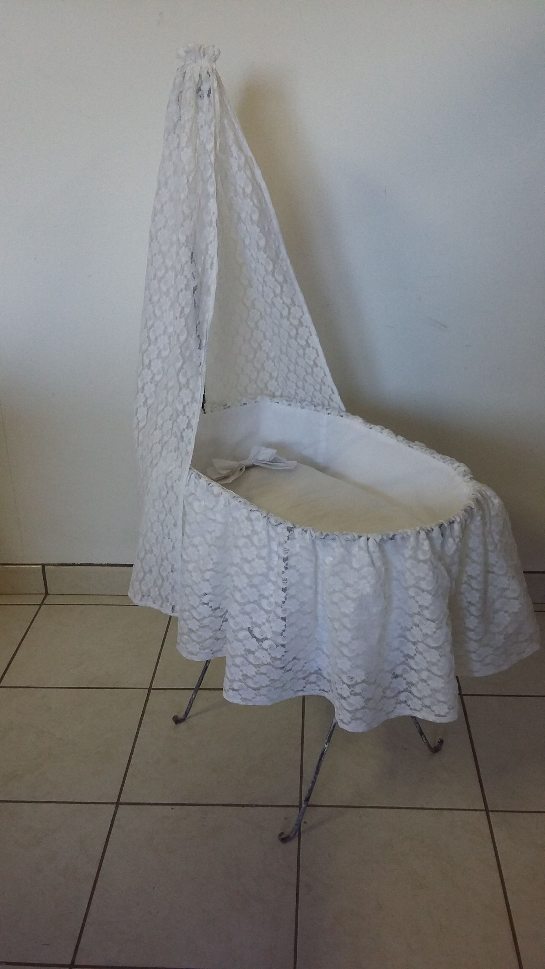Cradle old iron and lace doll