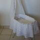 Cradle old iron and lace doll