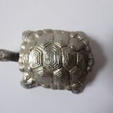Small box in the shape of a silver metal turtle