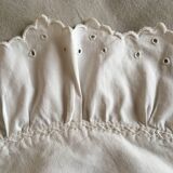 Two half-moon ruffled cushion covers