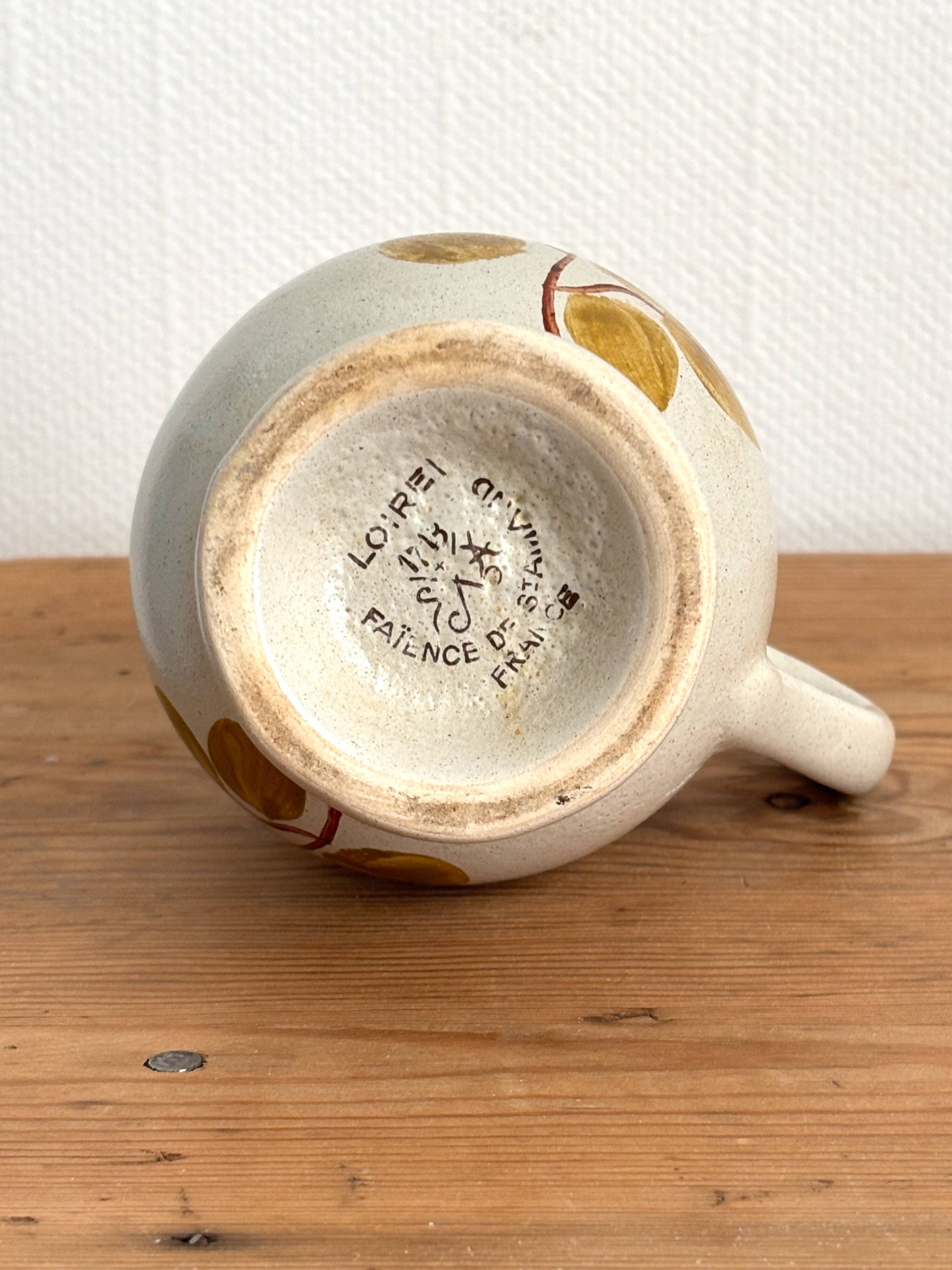 Vintage Maine St Amand earthenware pitcher with floral decorations