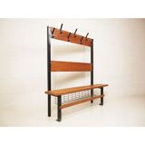 Locker room in gym with rail for coats