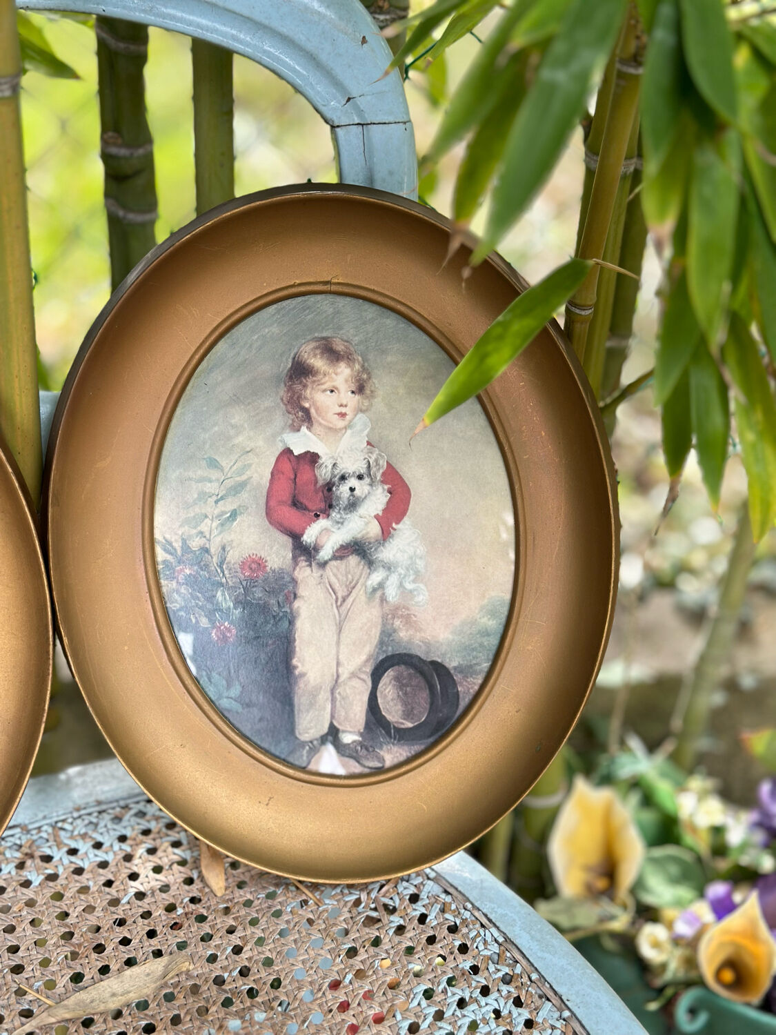 Set of 2 oval paintings