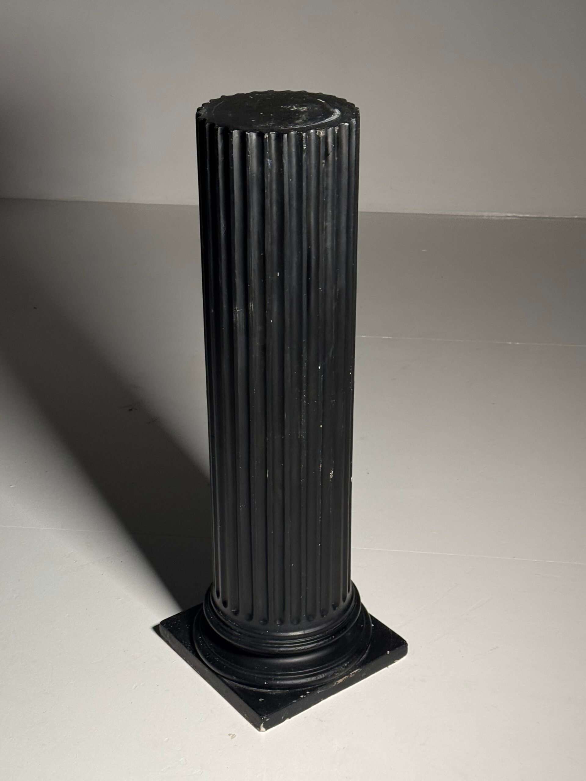 Neoclassical black plaster column