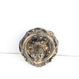 Bronze lion door knocker