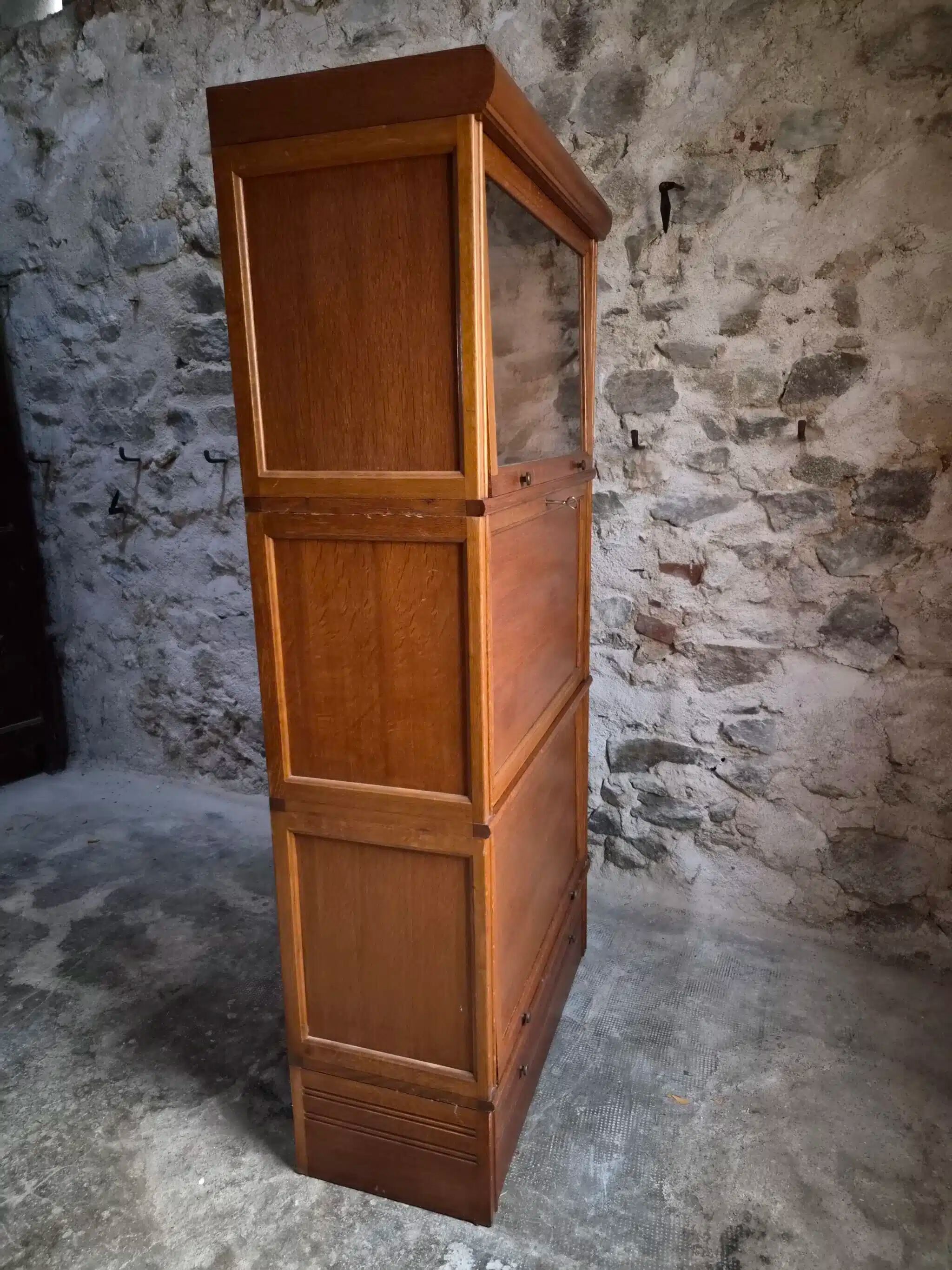 French modular secretary in oak with display case, 1950s.