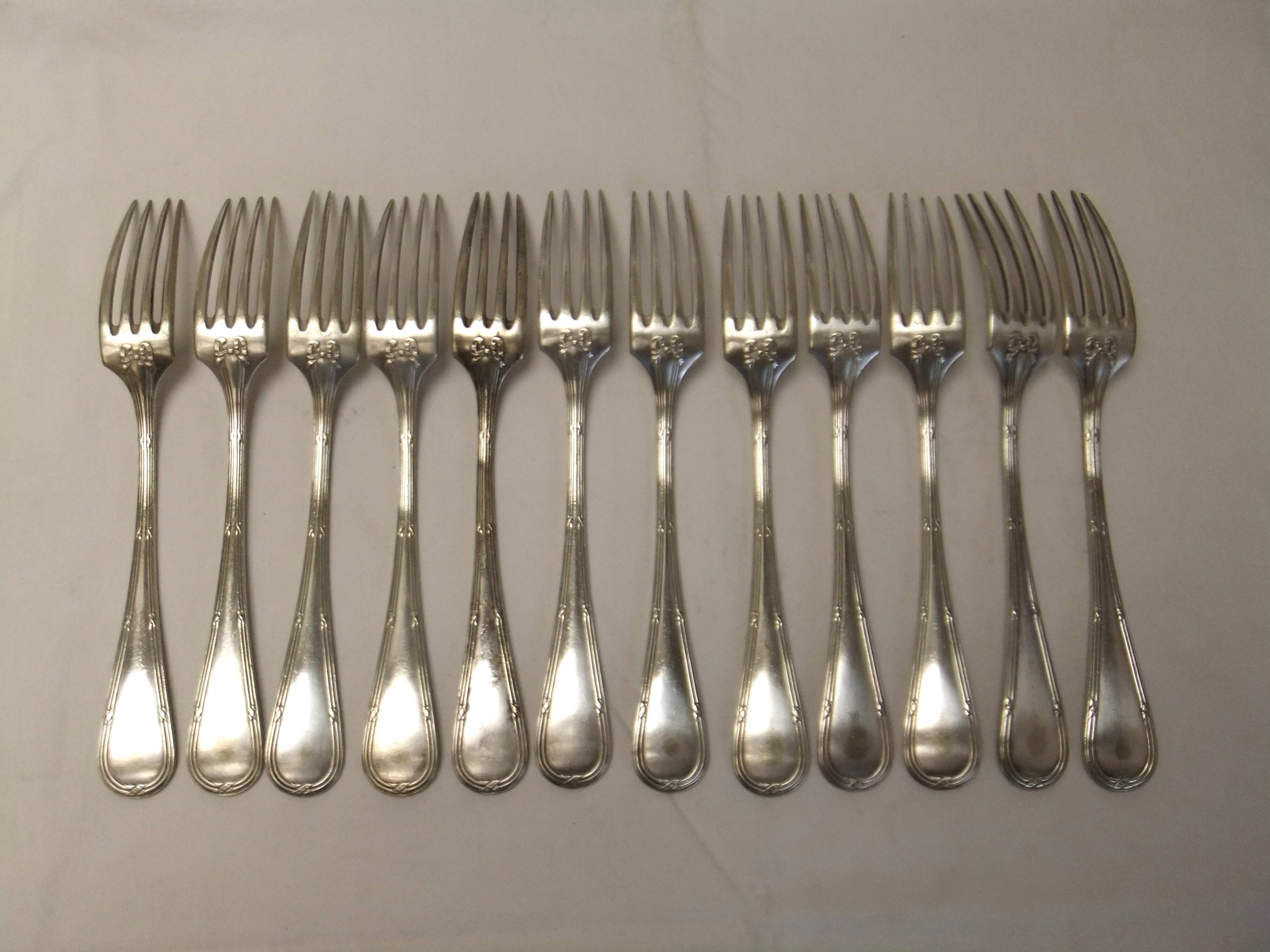 Old Louis XVI service fork with mesh ribbon