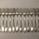 Old Louis XVI service fork with mesh ribbon