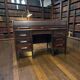 Vintage American wooden desk with a roll-top.