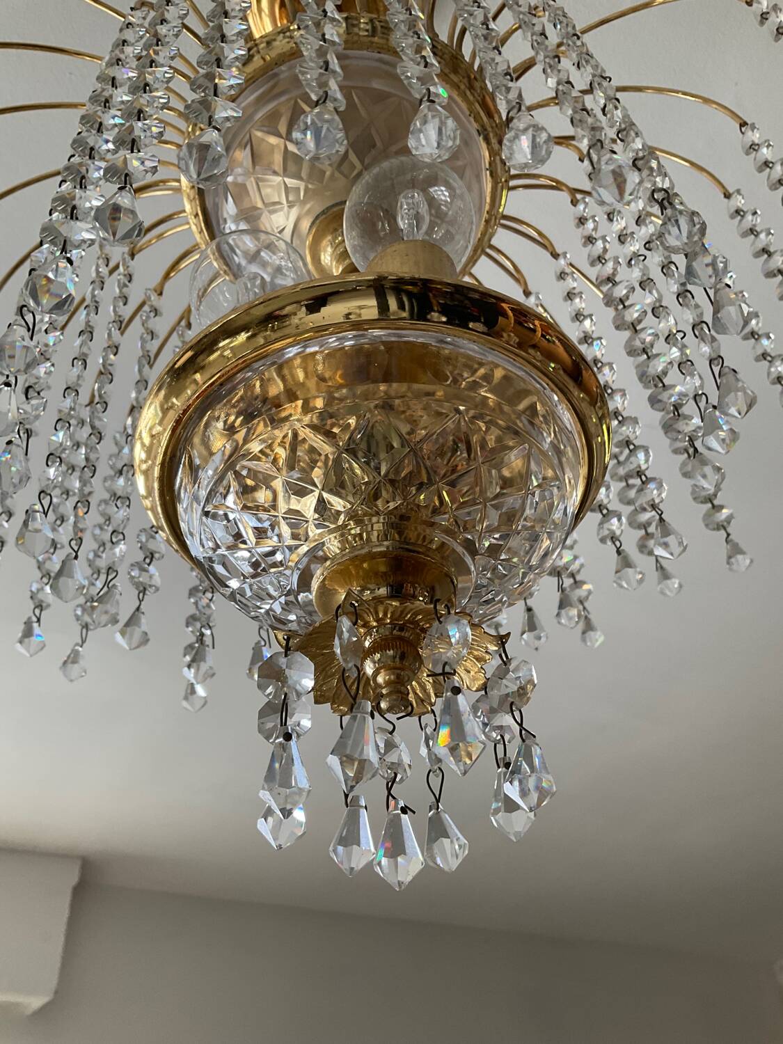 Brass waterfall chandelier with crystal tassels