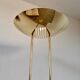 Old golden brass floor lamp with Italian design bulb from the 70s vintage