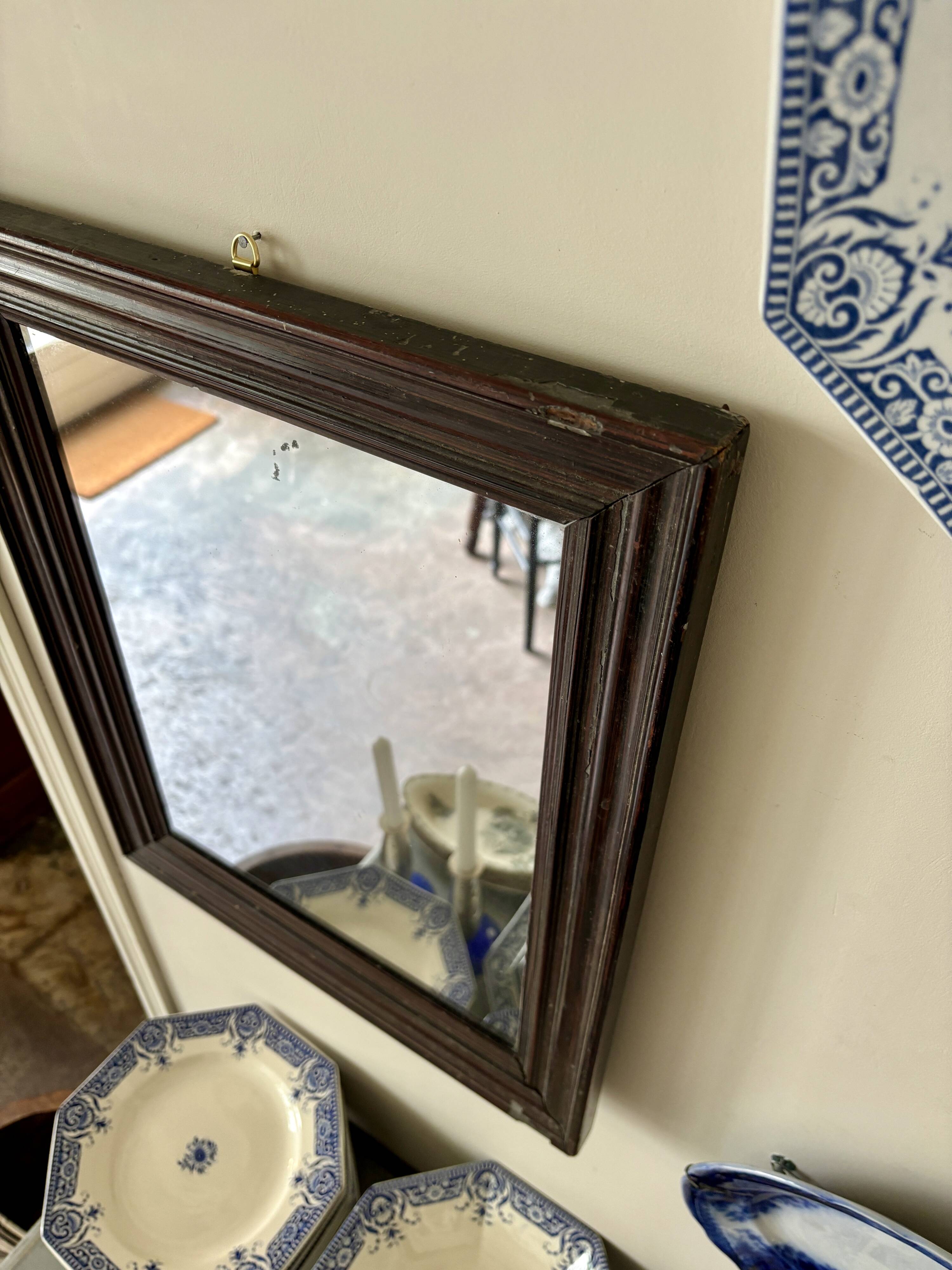 Dark wooden mirror ☐ 49.5 x 40 cm