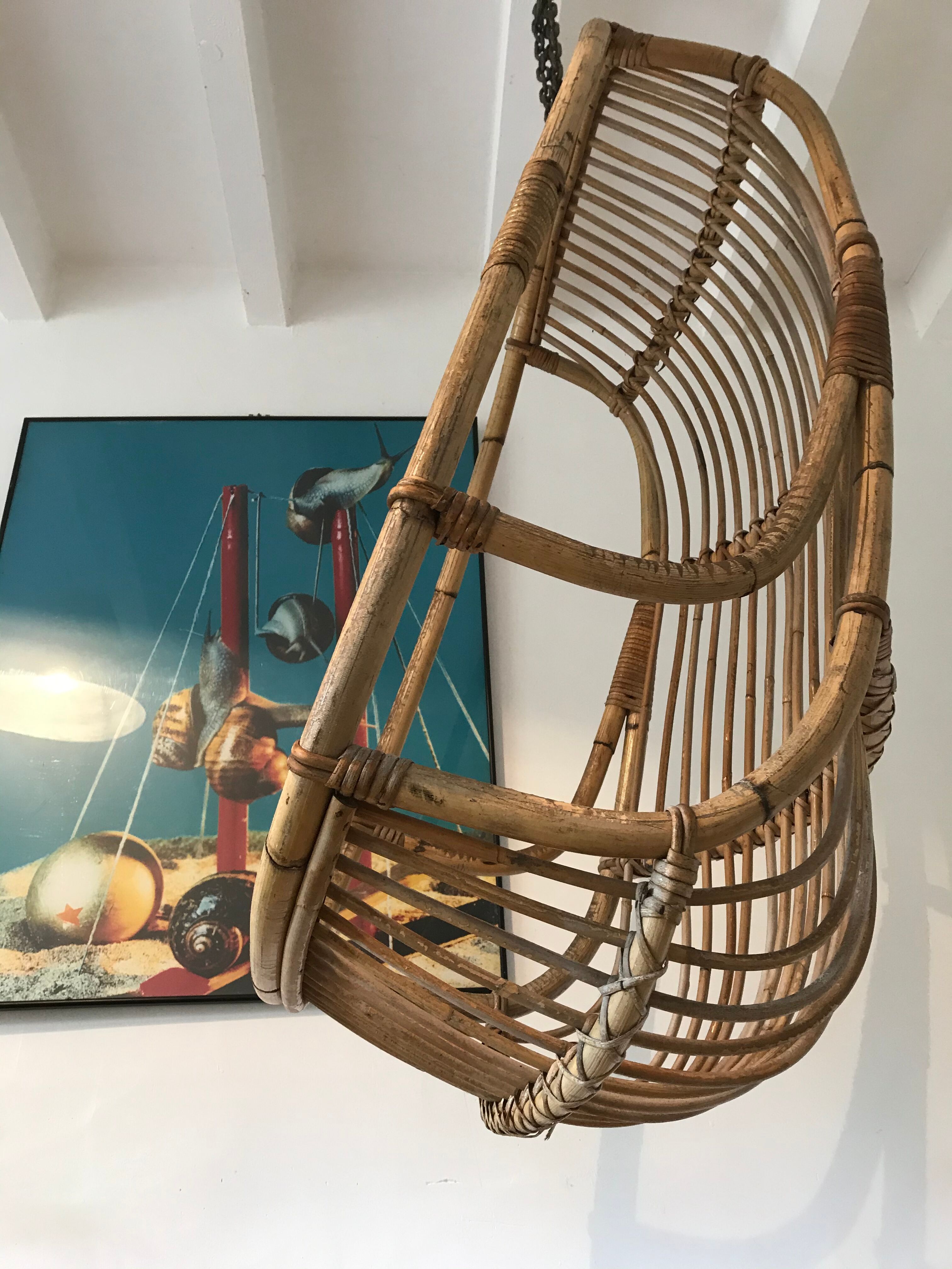 Vintage chair suspended in rattan