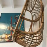 Vintage chair suspended in rattan