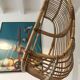 Vintage chair suspended in rattan