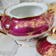Teapot in Limoges porcelain, burgundy and gold