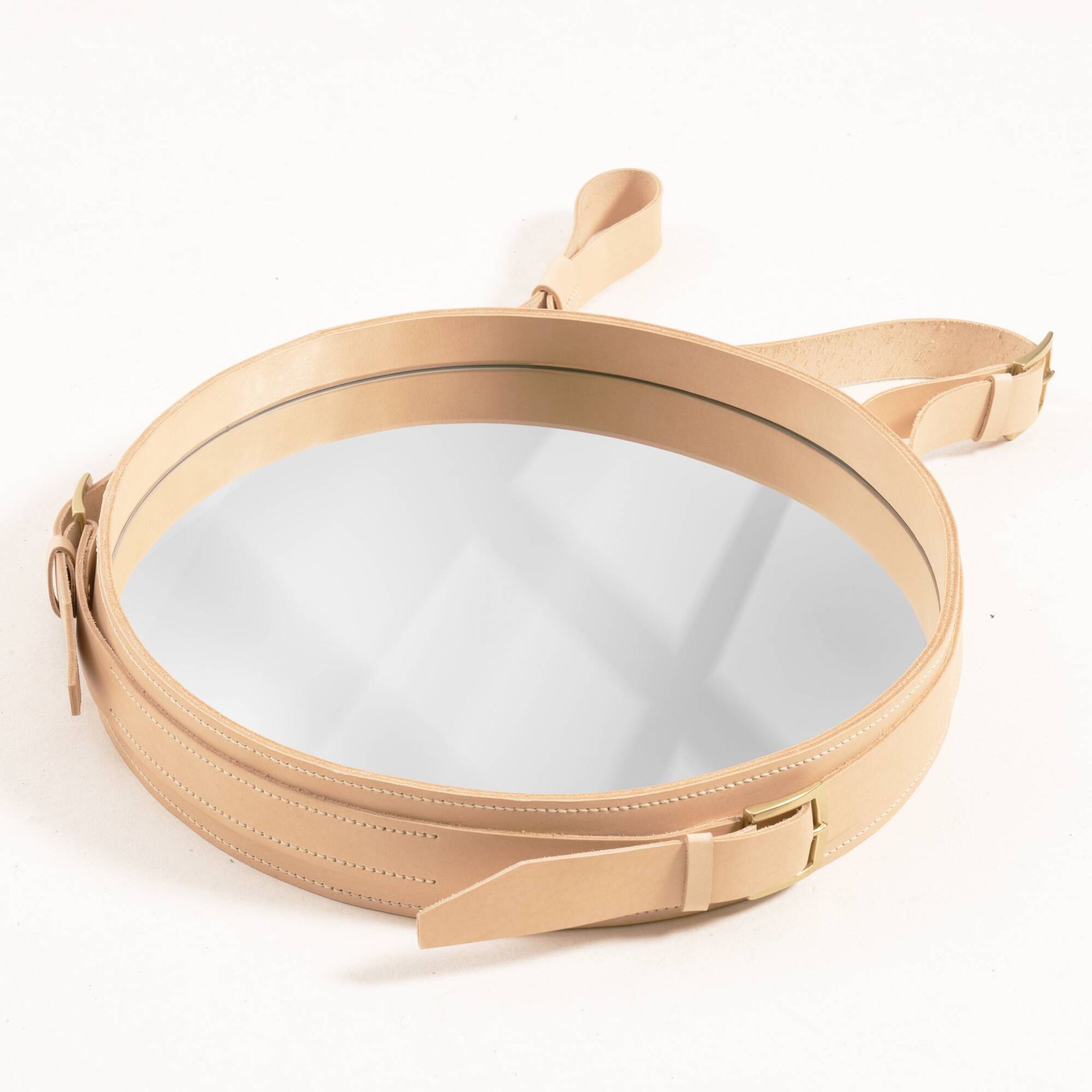 Handmade J. Adnet style mirror in natural vegetable-tanned leather, ø 45 cm