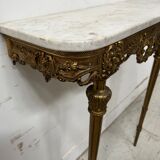 Louis XVI style console in chiselled bronze, 20th century.