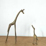 Giraffe and brass bird