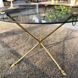 Table basse en verre et laiton pieds tripode en forme de sabot, 1970
