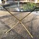 Glass and brass coffee table with hoof-shaped tripod legs, 1970