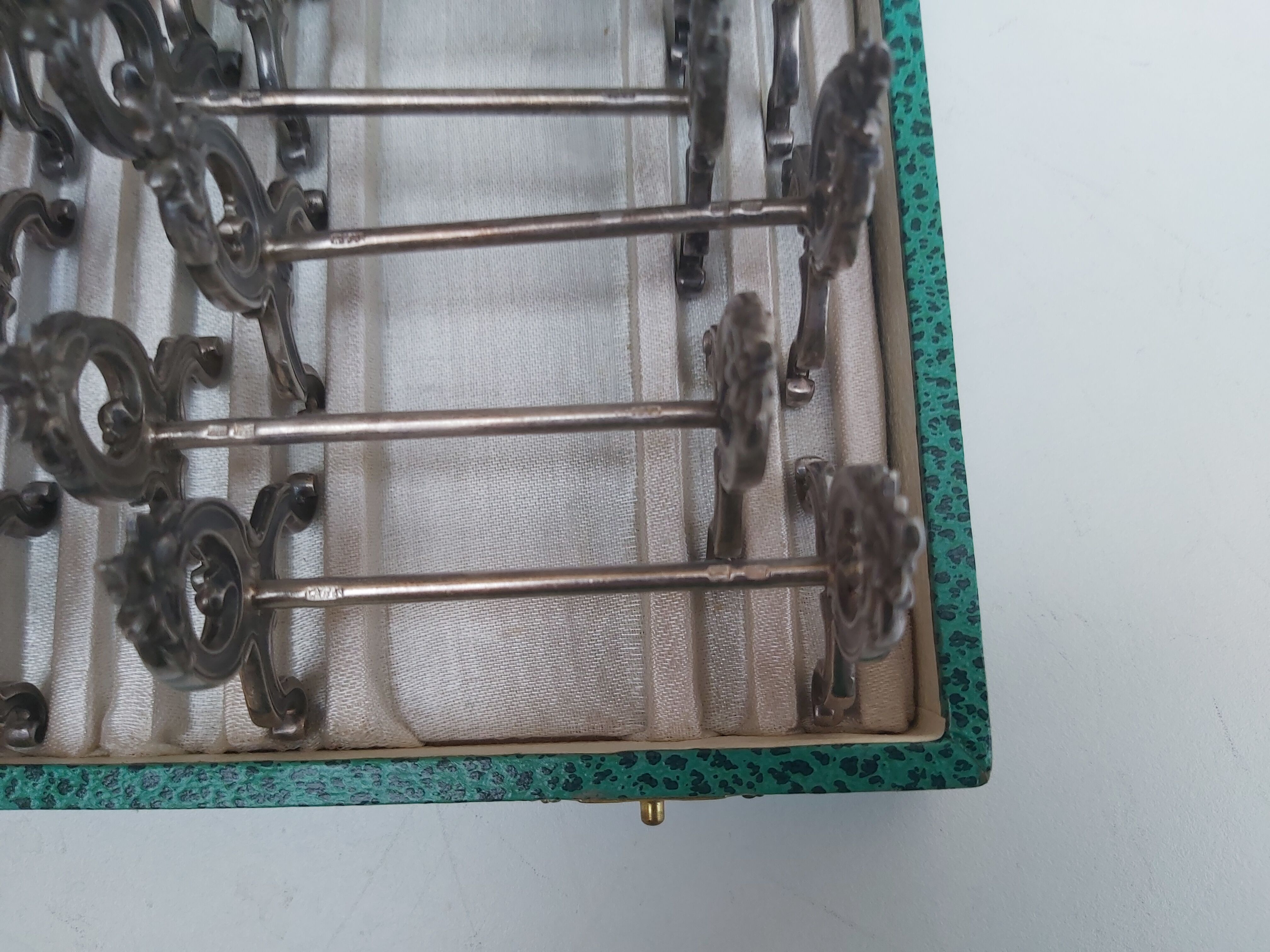12 knife holders in their SFAM silver metal box