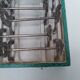 12 knife holders in their SFAM silver metal box