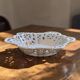 Vintage cup in openwork porcelain lace