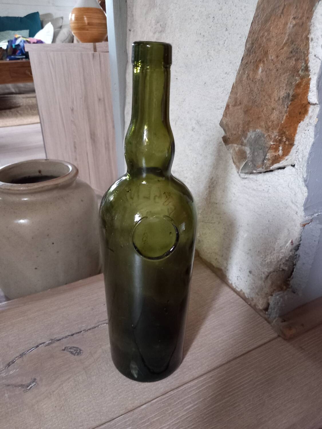 Old thick glass bottle