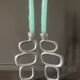 Pair of aluminum candlesticks