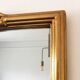 Vintage rectangular giltwood bevelled mirror with rose accents