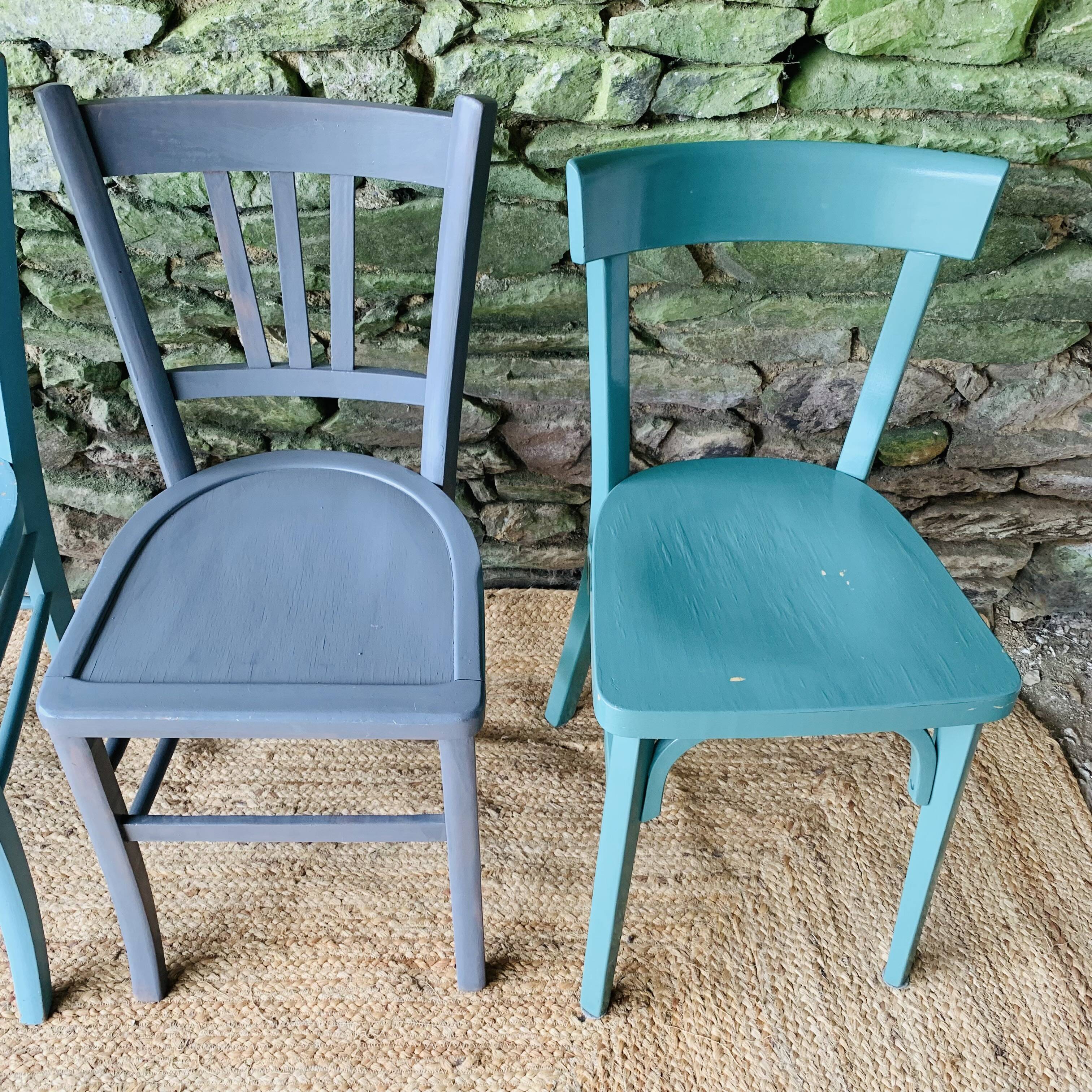 Set of four mismatched bistro chairs