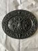 Decorative cast iron plaque from the early 20th century.