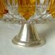 Coupe en cristal pied douche en metal argente