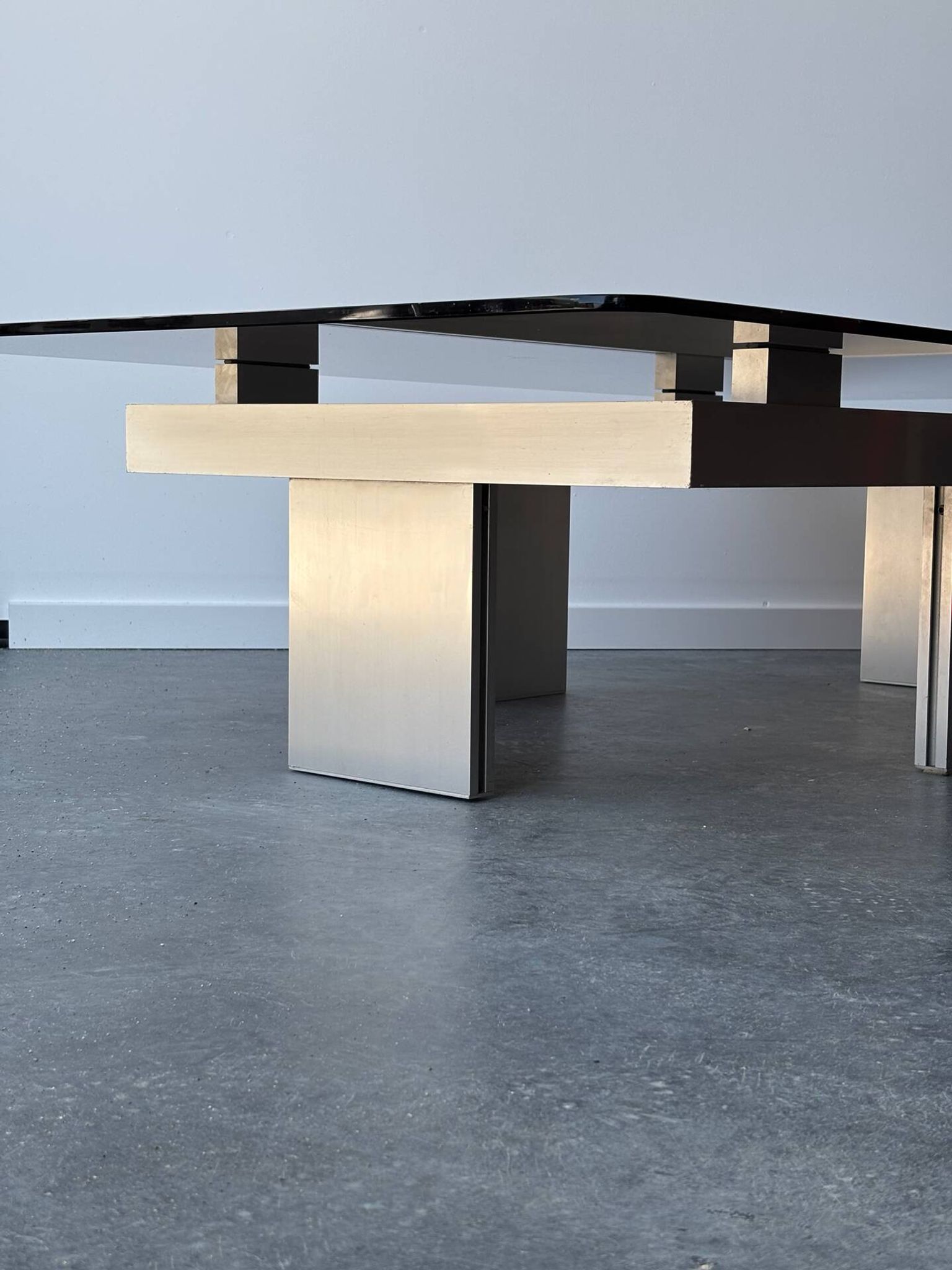 Large modernist coffee table in aluminium and smoked glass, 1970.