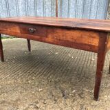 Antique farmhouse table in solid cherry wood with 3 drawers.