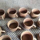 Series of 11 sandstone cups