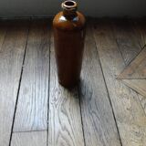 Vintage enamelled stoneware bottle