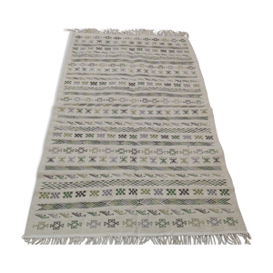 tapis blanc à motifs - main