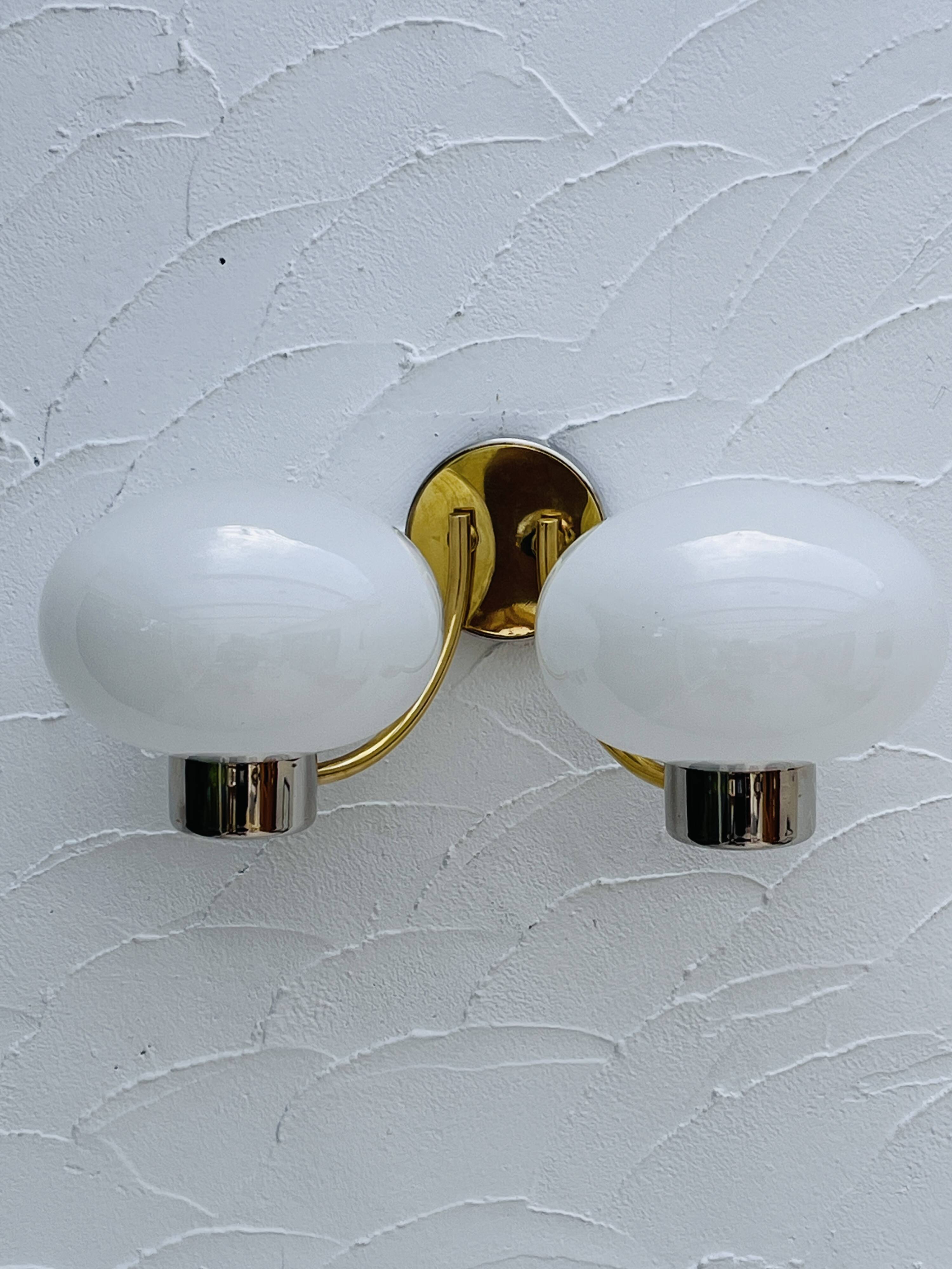 Double opaline brass wall light